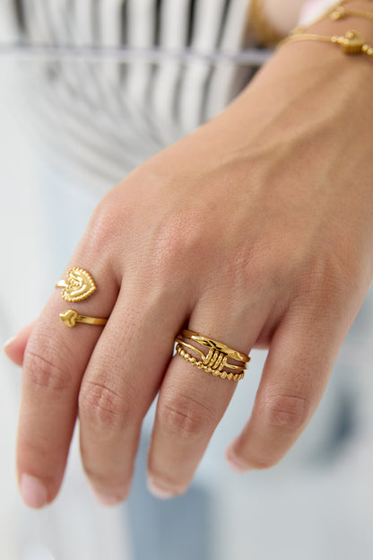 Layered ring with minimalist twisted detail